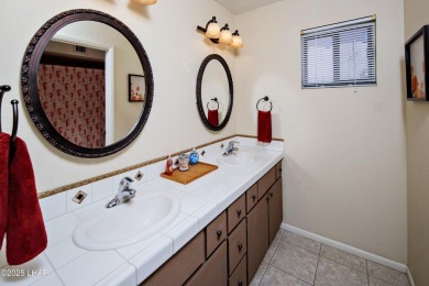 Welcome to 701 Paseo Granada!  This fully furnished pool home is on London Bridge Golf Course in Arizona - for sale on GolfHomes.com, golf home, golf lot