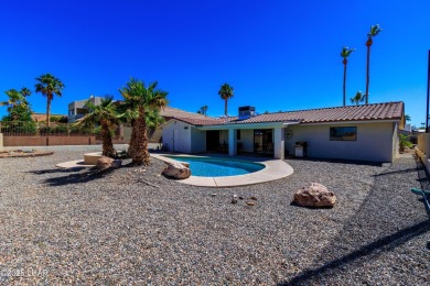 Welcome to 701 Paseo Granada!  This fully furnished pool home is on London Bridge Golf Course in Arizona - for sale on GolfHomes.com, golf home, golf lot
