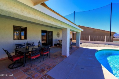 Welcome to 701 Paseo Granada!  This fully furnished pool home is on London Bridge Golf Course in Arizona - for sale on GolfHomes.com, golf home, golf lot