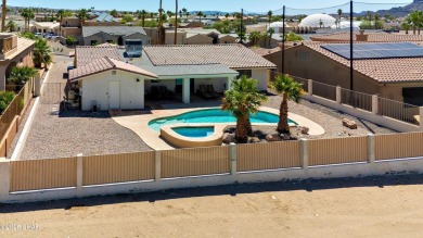 Welcome to 701 Paseo Granada!  This fully furnished pool home is on London Bridge Golf Course in Arizona - for sale on GolfHomes.com, golf home, golf lot