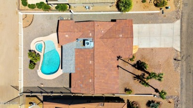 Welcome to 701 Paseo Granada!  This fully furnished pool home is on London Bridge Golf Course in Arizona - for sale on GolfHomes.com, golf home, golf lot