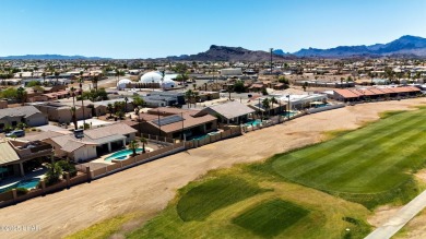 Welcome to 701 Paseo Granada!  This fully furnished pool home is on London Bridge Golf Course in Arizona - for sale on GolfHomes.com, golf home, golf lot