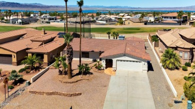 Welcome to 701 Paseo Granada!  This fully furnished pool home is on London Bridge Golf Course in Arizona - for sale on GolfHomes.com, golf home, golf lot