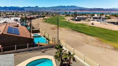 Welcome to 701 Paseo Granada!  This fully furnished pool home is on London Bridge Golf Course in Arizona - for sale on GolfHomes.com, golf home, golf lot