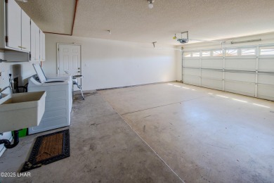 Welcome to 701 Paseo Granada!  This fully furnished pool home is on London Bridge Golf Course in Arizona - for sale on GolfHomes.com, golf home, golf lot