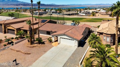 Welcome to 701 Paseo Granada!  This fully furnished pool home is on London Bridge Golf Course in Arizona - for sale on GolfHomes.com, golf home, golf lot