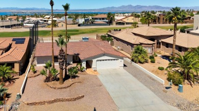 Welcome to 701 Paseo Granada!  This fully furnished pool home is on London Bridge Golf Course in Arizona - for sale on GolfHomes.com, golf home, golf lot
