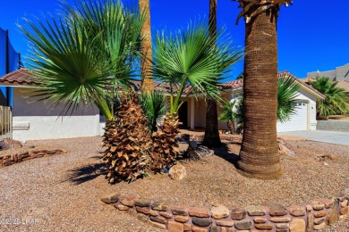 Welcome to 701 Paseo Granada!  This fully furnished pool home is on London Bridge Golf Course in Arizona - for sale on GolfHomes.com, golf home, golf lot