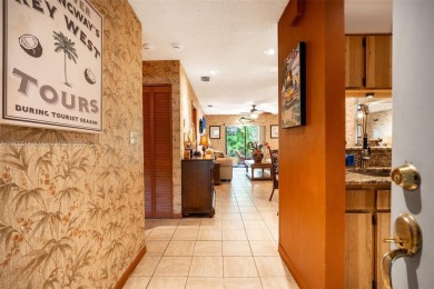 Welcome to Redbridge! This beautifully maintained single-story on Springtree Country Club in Florida - for sale on GolfHomes.com, golf home, golf lot