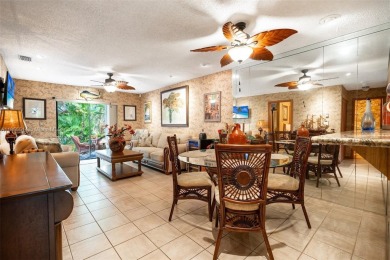 Welcome to Redbridge! This beautifully maintained single-story on Springtree Country Club in Florida - for sale on GolfHomes.com, golf home, golf lot