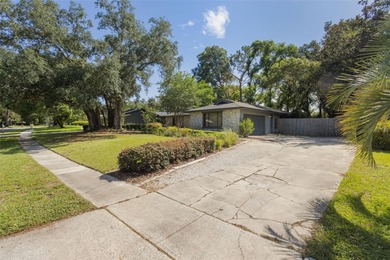Located in the highly desirable Tuscawilla community, this home on Tuscawilla Country Club in Florida - for sale on GolfHomes.com, golf home, golf lot