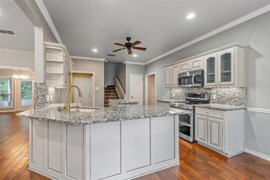 Experience resort-style living in this beautiful 4-bedroom on Hide-A-Way Lake Golf Course in Texas - for sale on GolfHomes.com, golf home, golf lot