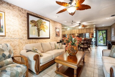 Welcome to Redbridge! This beautifully maintained single-story on Springtree Country Club in Florida - for sale on GolfHomes.com, golf home, golf lot