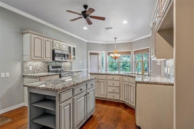 Experience resort-style living in this beautiful 4-bedroom on Hide-A-Way Lake Golf Course in Texas - for sale on GolfHomes.com, golf home, golf lot