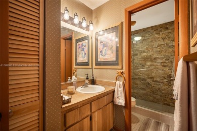 Welcome to Redbridge! This beautifully maintained single-story on Springtree Country Club in Florida - for sale on GolfHomes.com, golf home, golf lot