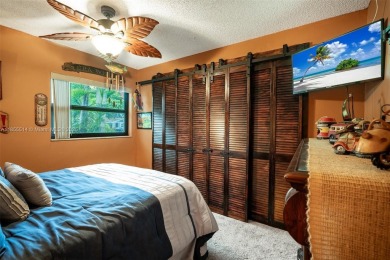 Welcome to Redbridge! This beautifully maintained single-story on Springtree Country Club in Florida - for sale on GolfHomes.com, golf home, golf lot