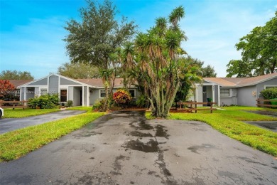 Welcome to Redbridge! This beautifully maintained single-story on Springtree Country Club in Florida - for sale on GolfHomes.com, golf home, golf lot