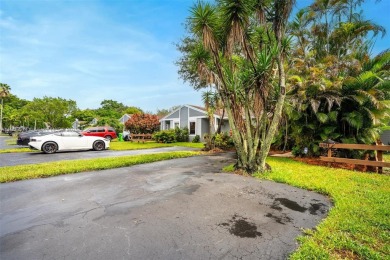 Welcome to Redbridge! This beautifully maintained single-story on Springtree Country Club in Florida - for sale on GolfHomes.com, golf home, golf lot
