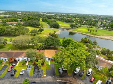 Welcome to Redbridge! This beautifully maintained single-story on Springtree Country Club in Florida - for sale on GolfHomes.com, golf home, golf lot