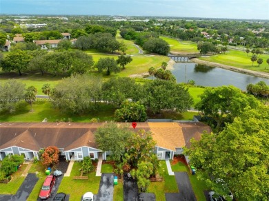 Welcome to Redbridge! This beautifully maintained single-story on Springtree Country Club in Florida - for sale on GolfHomes.com, golf home, golf lot