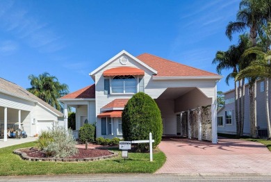 This home is perfect whether you are an RV'er or not with on The Great Outdoors Golf and Country Club in Florida - for sale on GolfHomes.com, golf home, golf lot
