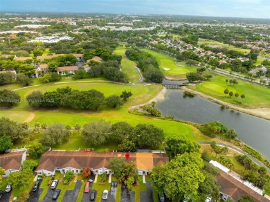 Welcome to Redbridge! This beautifully maintained single-story on Springtree Country Club in Florida - for sale on GolfHomes.com, golf home, golf lot