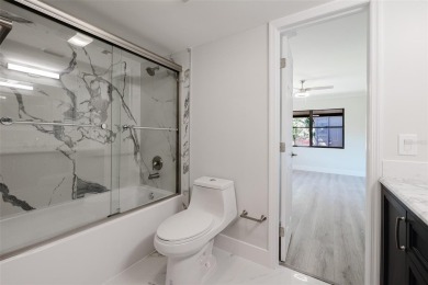 JUST FINISHED THIS BEAUTIFUL NEW RENOVATION!! Be the FIRST to on Palm Aire Country Club of Sarasota in Florida - for sale on GolfHomes.com, golf home, golf lot
