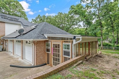 Experience resort-style living in this beautiful 4-bedroom on Hide-A-Way Lake Golf Course in Texas - for sale on GolfHomes.com, golf home, golf lot