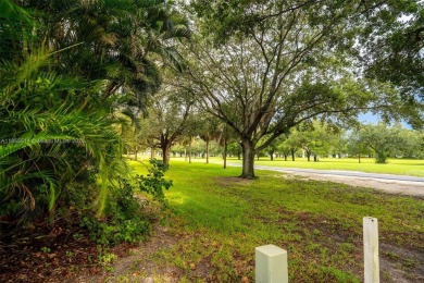 Welcome to Redbridge! This beautifully maintained single-story on Springtree Country Club in Florida - for sale on GolfHomes.com, golf home, golf lot