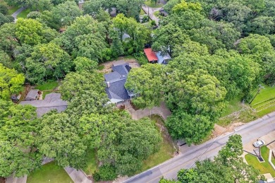Experience resort-style living in this beautiful 4-bedroom on Hide-A-Way Lake Golf Course in Texas - for sale on GolfHomes.com, golf home, golf lot