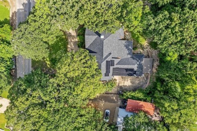 Experience resort-style living in this beautiful 4-bedroom on Hide-A-Way Lake Golf Course in Texas - for sale on GolfHomes.com, golf home, golf lot