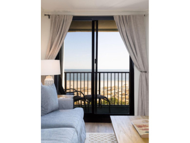 Indulge in luxury with this turnkey penthouse oceanfront condo on Wild Dunes Harbor Golf Resort in South Carolina - for sale on GolfHomes.com, golf home, golf lot