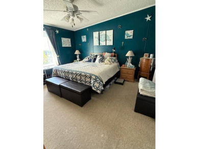 Panoramic golf and water views from this great home in The on Hamptons Golf Club in Florida - for sale on GolfHomes.com, golf home, golf lot