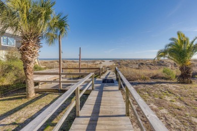 Indulge in luxury with this turnkey penthouse oceanfront condo on Wild Dunes Harbor Golf Resort in South Carolina - for sale on GolfHomes.com, golf home, golf lot