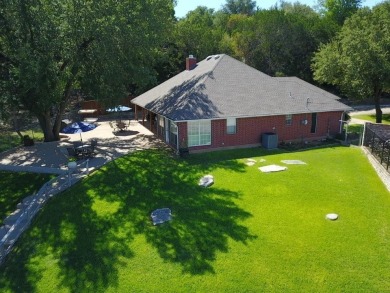 DEEP WATERFRONT, DOCKABLE HOME ON NEARLY HALF AN ACRE IN THE on De Cordova Bend Country Club in Texas - for sale on GolfHomes.com, golf home, golf lot