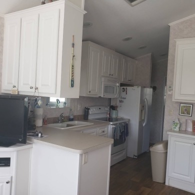 This large furnished 1/1 is located in The Waves RV Resort, a 55 on The Rookery At Marco in Florida - for sale on GolfHomes.com, golf home, golf lot