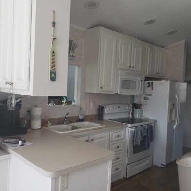 This large furnished 1/1 is located in The Waves RV Resort, a 55 on The Rookery At Marco in Florida - for sale on GolfHomes.com, golf home, golf lot