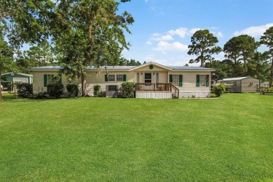HOME, BOAT , GOLF CART AND MULTIPLE STORAGE BUILDINGS CAN BE ALL on Sapelo Hammock Golf Club in Georgia - for sale on GolfHomes.com, golf home, golf lot