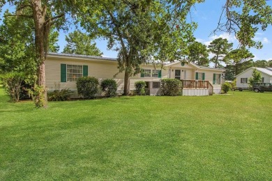 HOME, BOAT , GOLF CART AND MULTIPLE STORAGE BUILDINGS CAN BE ALL on Sapelo Hammock Golf Club in Georgia - for sale on GolfHomes.com, golf home, golf lot