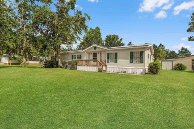 HOME, BOAT , GOLF CART AND MULTIPLE STORAGE BUILDINGS CAN BE ALL on Sapelo Hammock Golf Club in Georgia - for sale on GolfHomes.com, golf home, golf lot