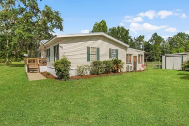 HOME, BOAT , GOLF CART AND MULTIPLE STORAGE BUILDINGS CAN BE ALL on Sapelo Hammock Golf Club in Georgia - for sale on GolfHomes.com, golf home, golf lot