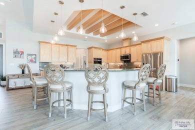 Spacious garage is 1242 sq ft which includes two car garage (24 on South Padre Island Golf Club in Texas - for sale on GolfHomes.com, golf home, golf lot