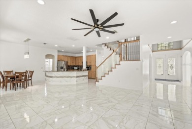 Welcome to this stunning 6-bedroom, 4.5-bath home in the heart on Mayfair Country Club in Florida - for sale on GolfHomes.com, golf home, golf lot