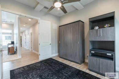 Spacious garage is 1242 sq ft which includes two car garage (24 on South Padre Island Golf Club in Texas - for sale on GolfHomes.com, golf home, golf lot