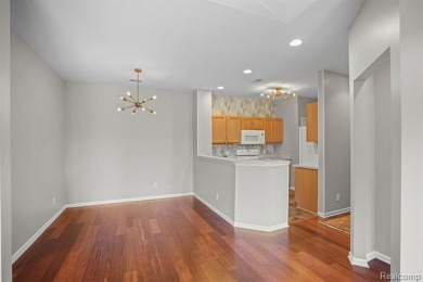 Welcome to this beautifully updated upper-level 2-bedroom on The Captains Club At Woodfield in Michigan - for sale on GolfHomes.com, golf home, golf lot