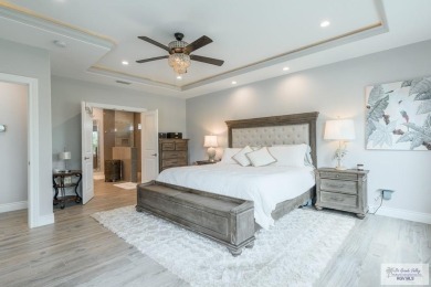 Spacious garage is 1242 sq ft which includes two car garage (24 on South Padre Island Golf Club in Texas - for sale on GolfHomes.com, golf home, golf lot