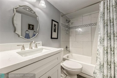 This charming, partially furnished, two bedroom, one and a half on Hillsboro Pines Golf in Florida - for sale on GolfHomes.com, golf home, golf lot