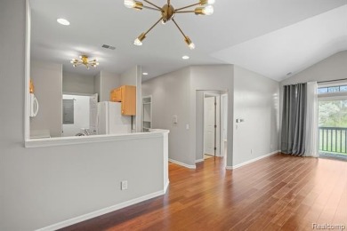 Welcome to this beautifully updated upper-level 2-bedroom on The Captains Club At Woodfield in Michigan - for sale on GolfHomes.com, golf home, golf lot