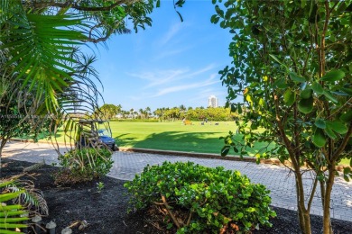 TWO STORY HOME ON THE LA GORCE COUNTRY CLUB GOLF COURSE IN THE on La Gorce Country Club in Florida - for sale on GolfHomes.com, golf home, golf lot