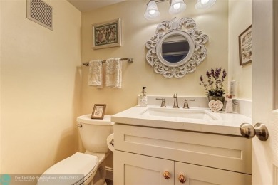 This charming, partially furnished, two bedroom, one and a half on Hillsboro Pines Golf in Florida - for sale on GolfHomes.com, golf home, golf lot